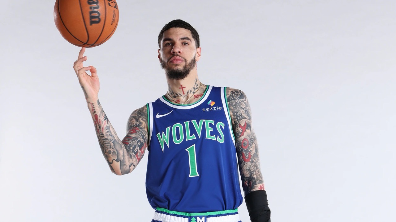 LaMelo Ball spinning a basketball on his finger in a Minnesota Timberwolves jersey